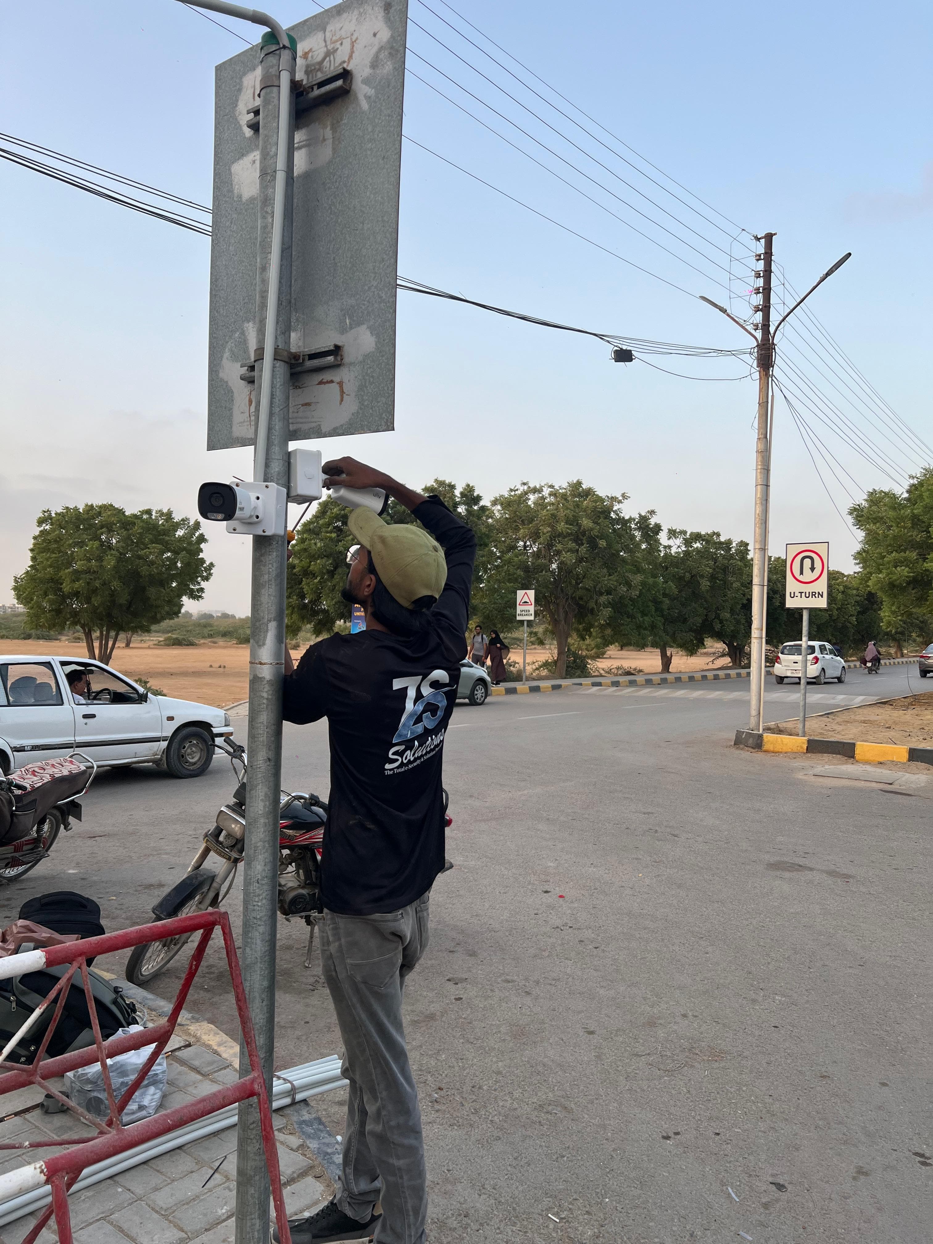 ZS Solutions team cabling and aligning outdoor cameras